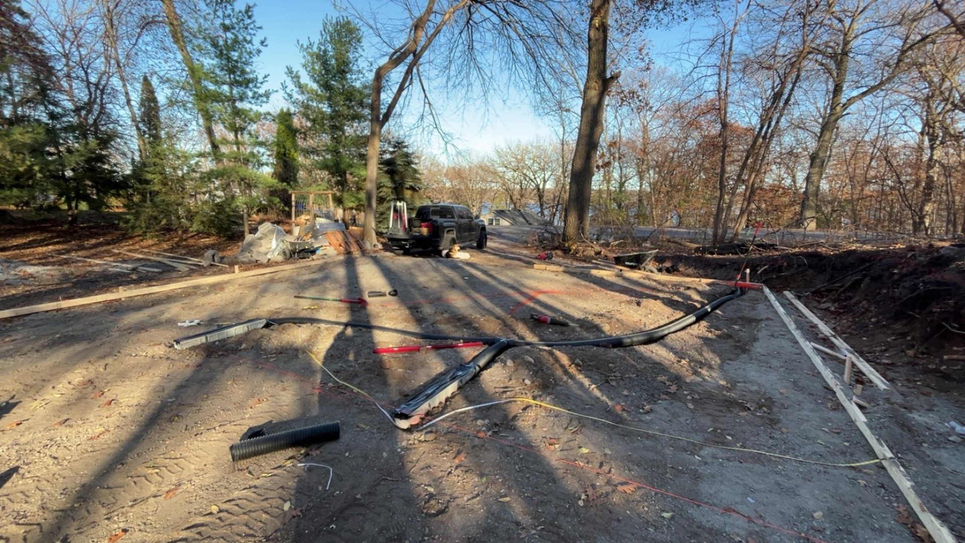 During: backyard concrete pad freshly poured with the truck onsite